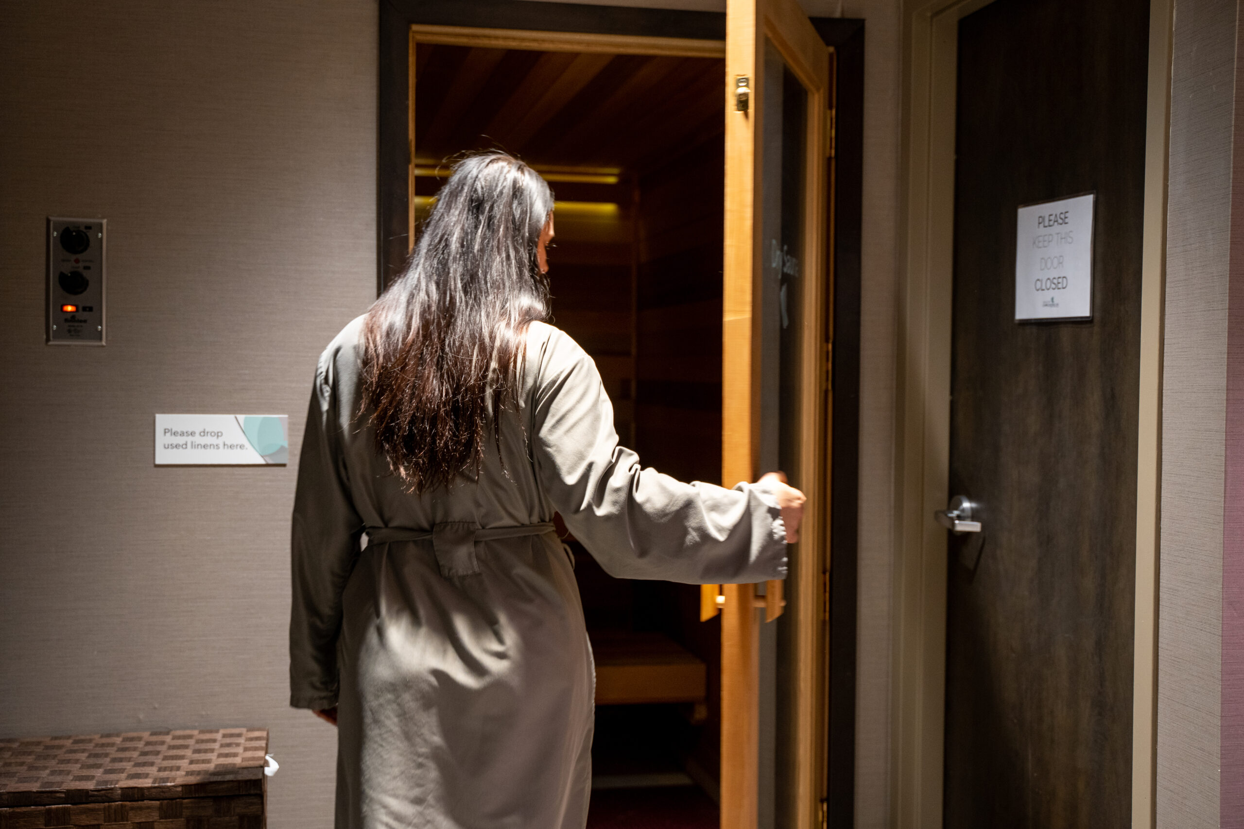 Women getting into a relaxing hot sauna in Healthy Complexions Spa.
